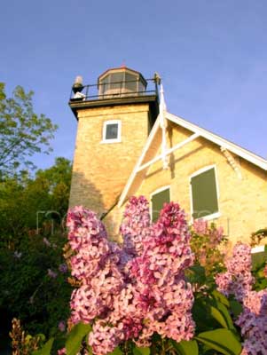 Spring blossoms at Eagle Bluff Lighthouse, one of ten lighthouses in Door County, are part of the annual Door County Festival of Blossoms taking place from April 30 - June 6, 2010.